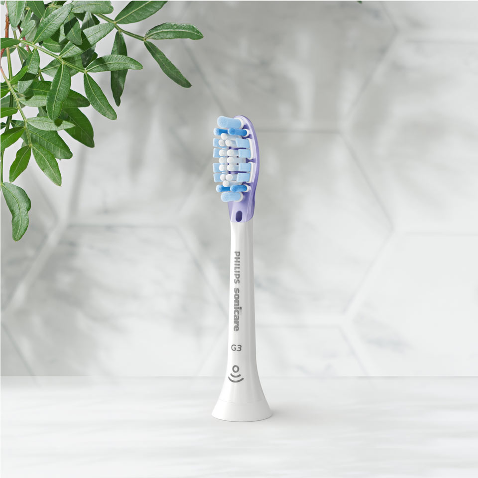 Un cabezal de cepillado Premium Gum Care sobre una superficie